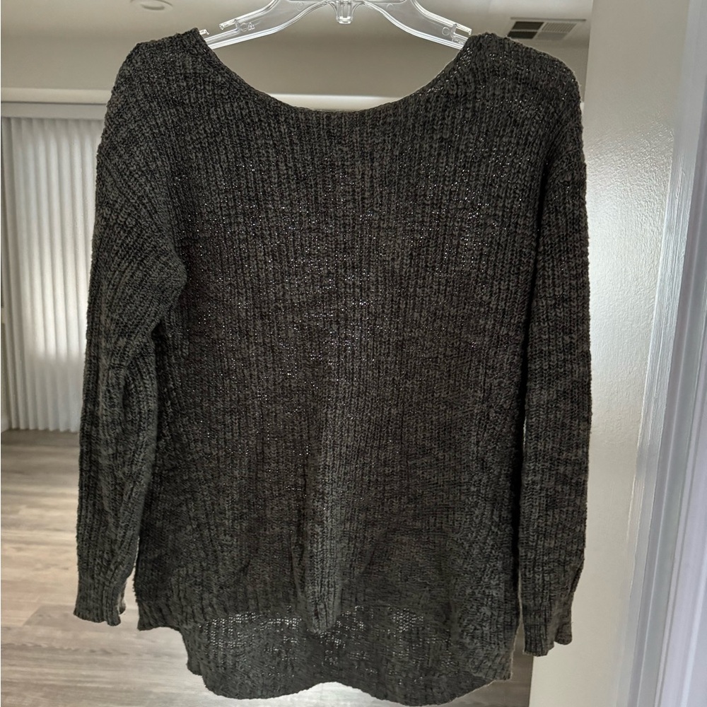 Dark green sweater. Worn a good amount of times.